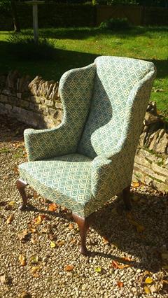 Howard and Sons antique wing chair.jpg
